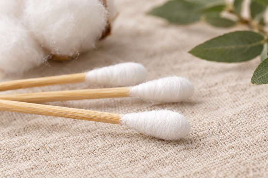 Close up of EcoFox bamboo cotton swab tips with cotton tightly wound on the bamboo stick